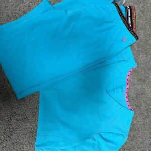 Scrub pants, scrub sets, scrub tops, different brands, and sizes